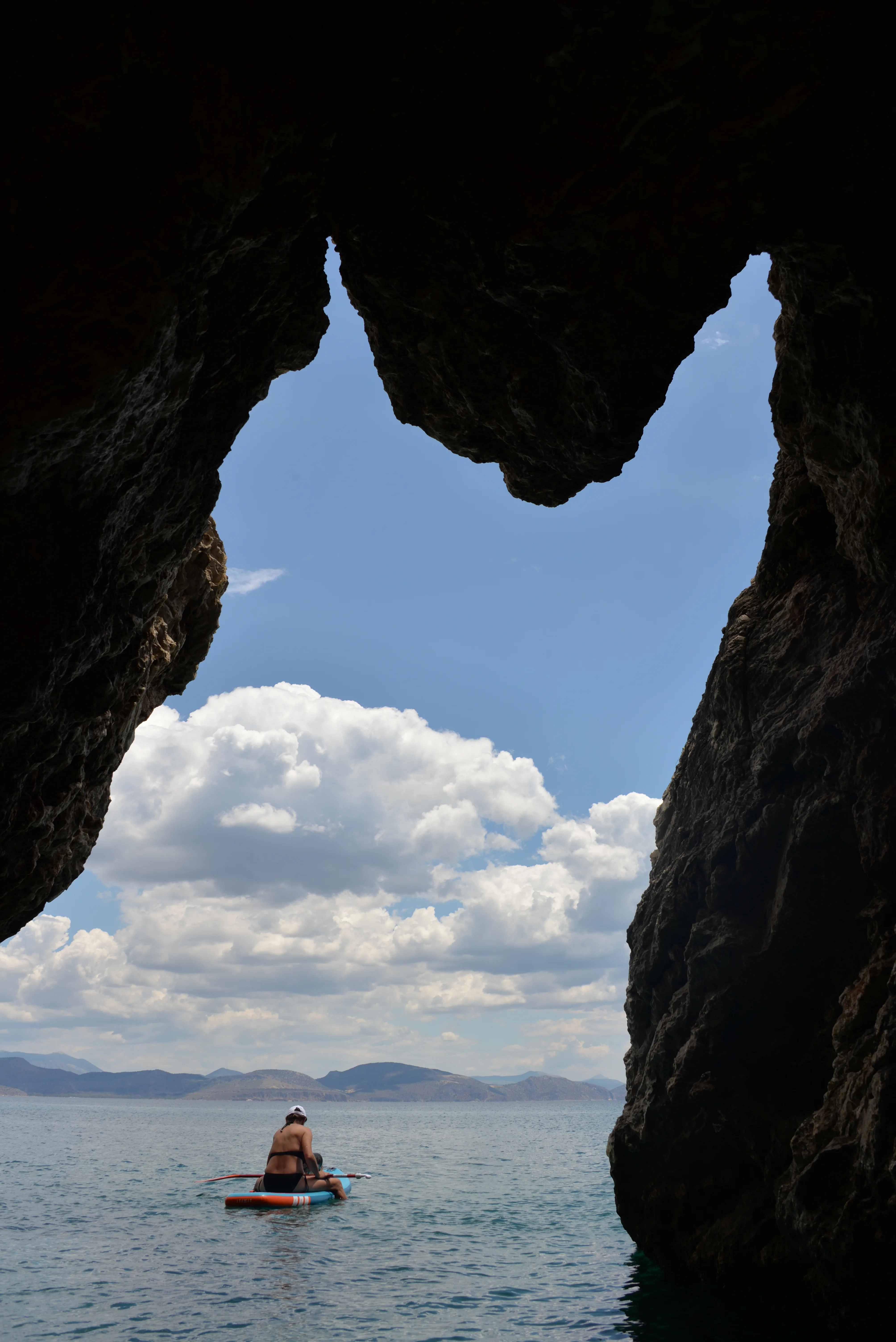 Sky and clouds seen from inside a sea cave